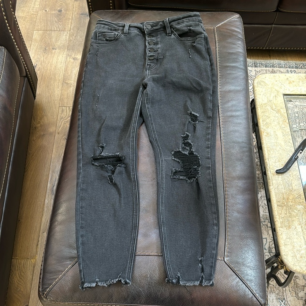 Women’s black buttonfly, distressed raw hem edge jeans size 31 brand is CEROS
